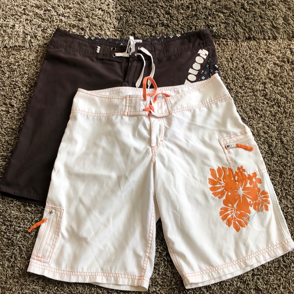 Two pair of women’s board shorts.